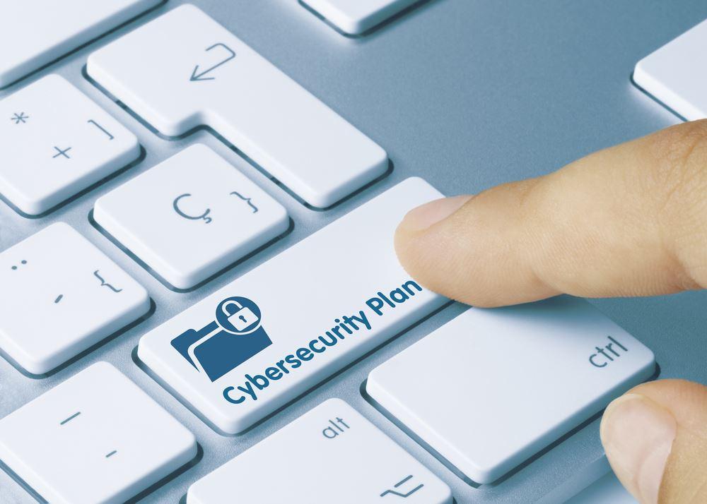 Cybersecurity Plan - Inscription on White Keyboard Key.